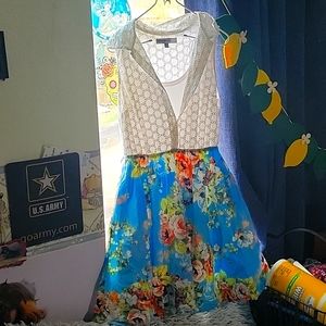 White and blue floral dress, sleeveless button up top
